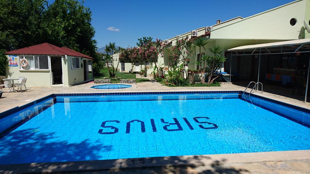 Sirius Hotel Далян Екстериор снимка